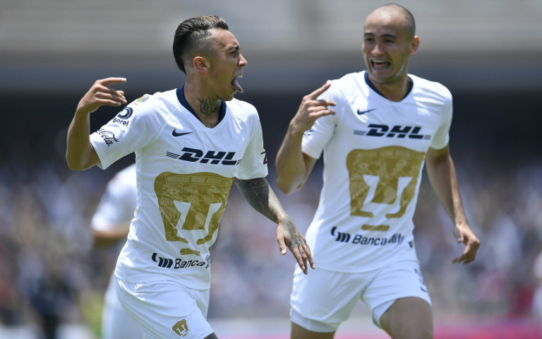  Rodríguez and González celebrate goal against Necaxa 