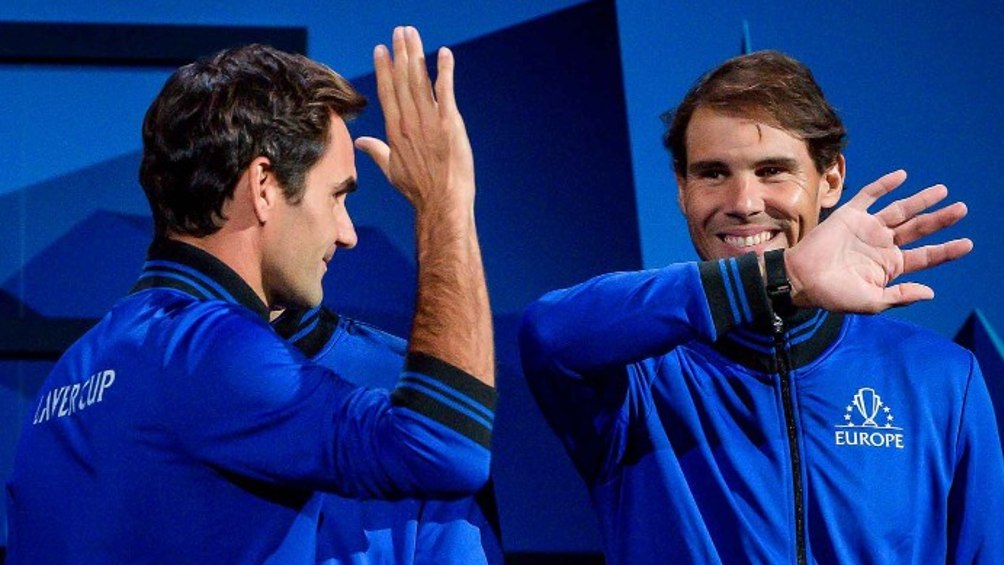 Roger Federer y Rafael Nadal jugando partido juntos