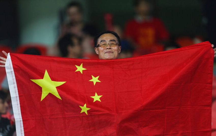 Aficionado chino en un partido de su Selección 