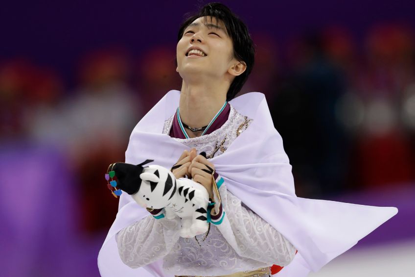 Yuzuru Hanyu tras lograr la medalla de oro