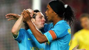 Messi y Ronaldinho en el Barcelona