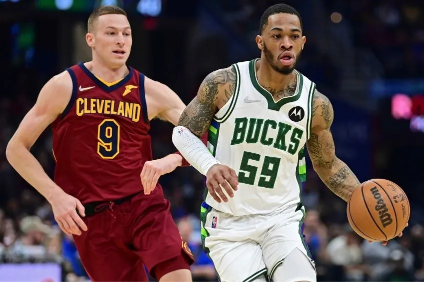 AP Rayjon Tucker y Dylan Windler durante el partido