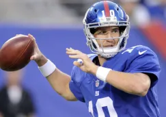 Eli Manning se prepara para lanzar el ovoide