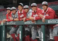 El bullpen de los rojos celebrando la victoria momentánea