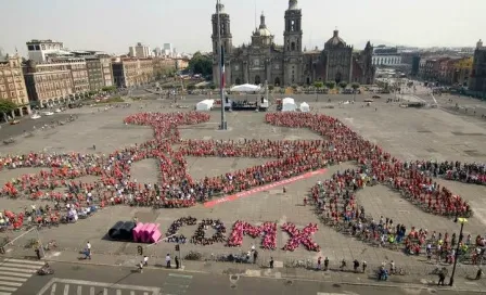 Arman bicicleta humana en el Zócalo capitalino