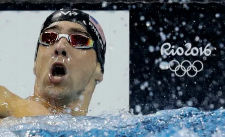 Phelps gana su Oro 22 en JO