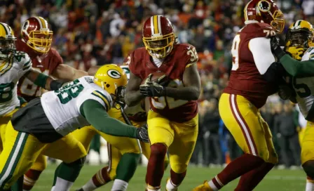 Redskins propina paliza a Packers y respira en la temporada