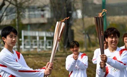 Tokio 2020: Mujer intentó apagar antorcha olímpica con pistola de agua