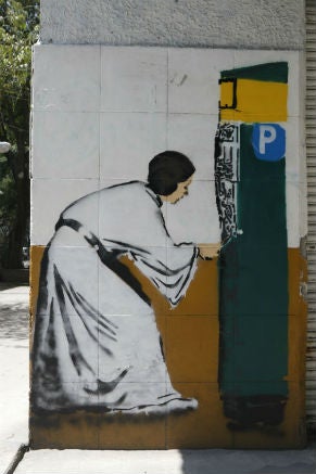 La Princesa Leia pagando su parquímetro