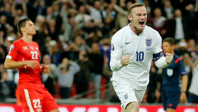 Rooney festeja un gol contra Suiza en la eliminatorias