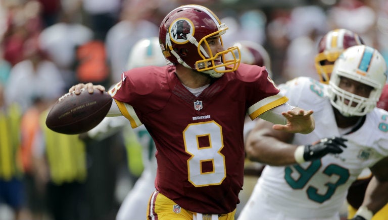 Kirk Cousins a punto de lanzar un pase