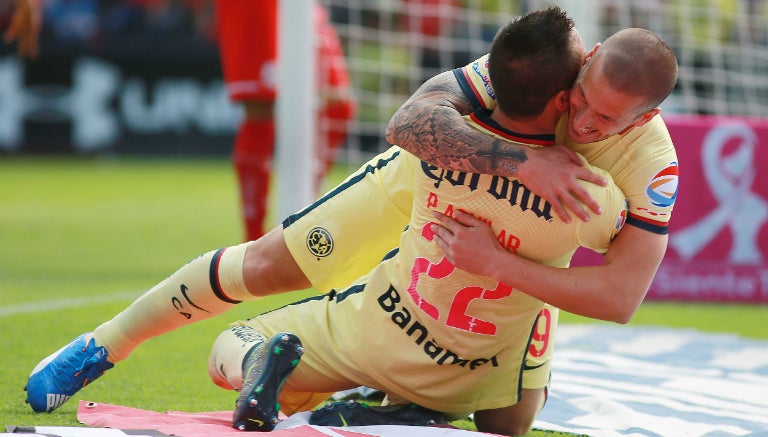 Benedetto y Aguilar en el festejo