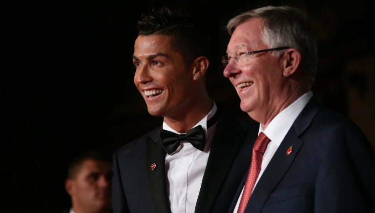 Cristiano junto a Ferguson, su entrenador en Manchester