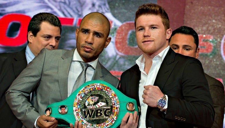 Cotto y Canelo posan con el cinturón