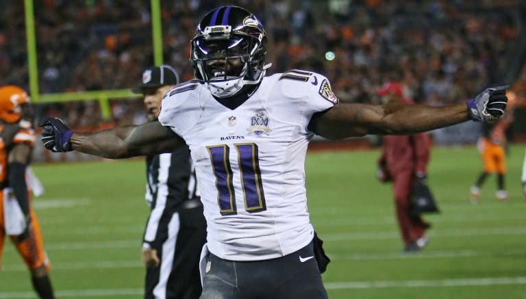 Kamar Aiken festeja un touchdown