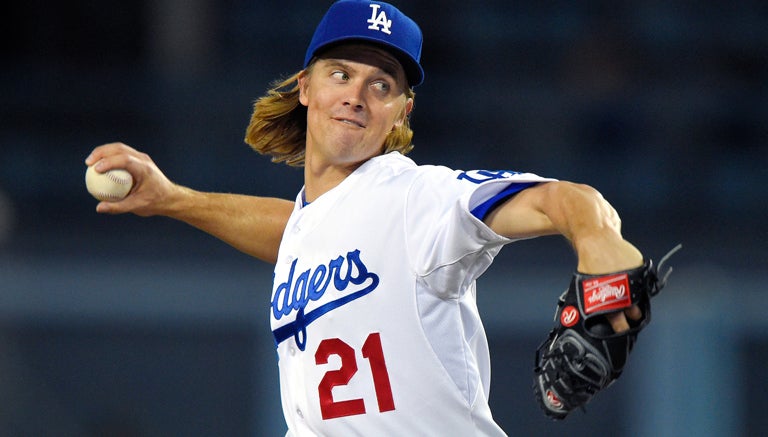 Zack Greinke realiza un lanzamiento