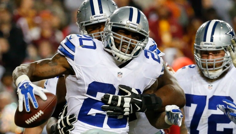 Darren McFadden festeja anotación con Dallas