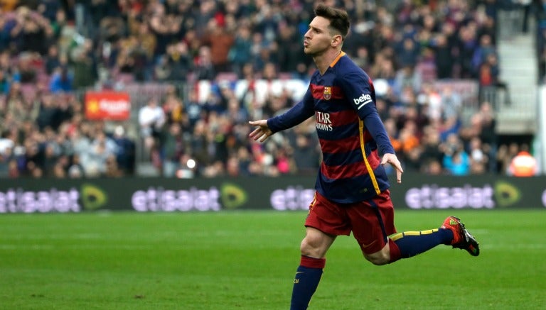 Lionel Messi festeja un gol con Barcelona