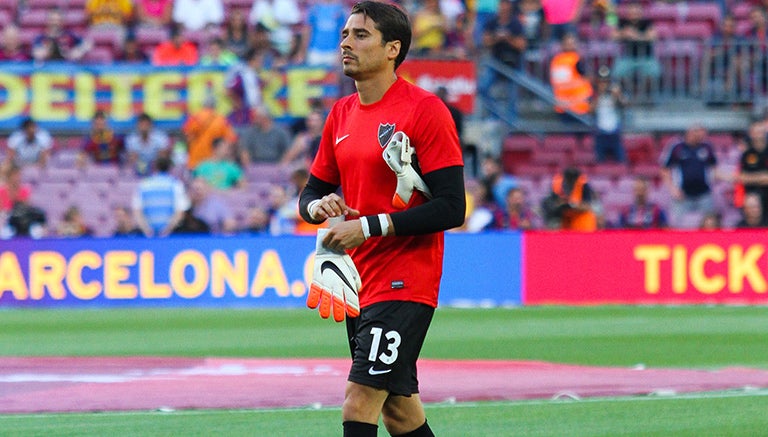 Ochoa en un calentamiento con el Málaga