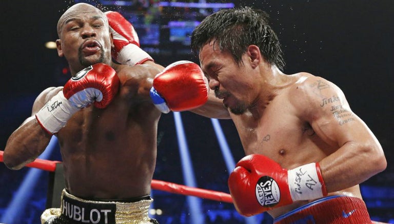 Floyd y Pacquiao en el intercambio de golpes