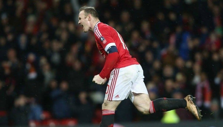 Wayne Rooney grita en forma de celebración