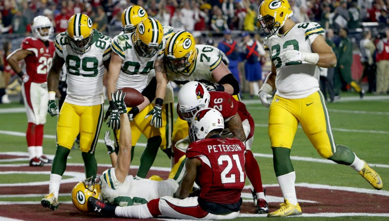 Jugadores de Green Bay previo al festejo con Janis