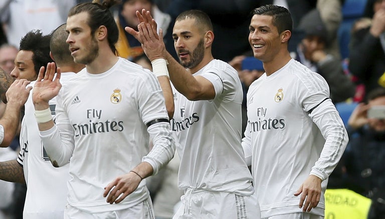 Jugadores del Real Madrid festejan un gol