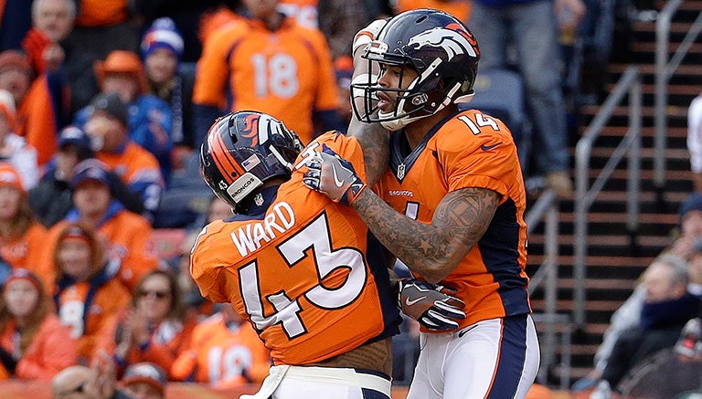  Chris Harper celebra con T.J. Ward