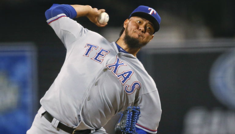 Gallardo durante su labor como pitcher de Texas