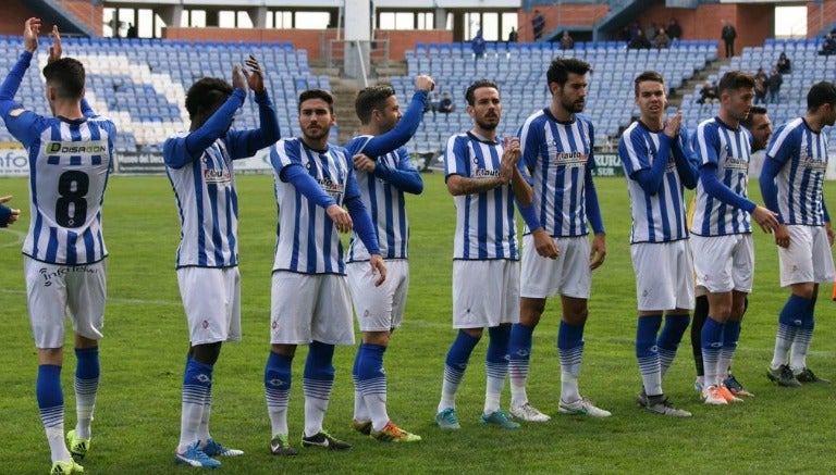 Jugadores del Huelva antes de un partido