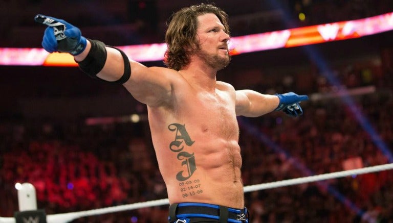 AJ Styles festeja después de una lucha