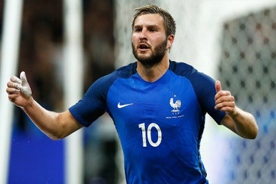 Gignac celebra un gol con Francia