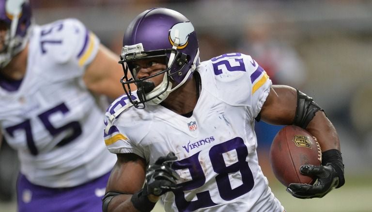 Adrian Peterson en un partido de los Vikingos