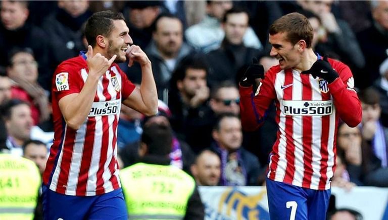 Koke celebra junto a Antoine Griezmann