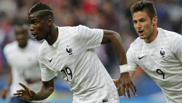 Pogba y Giroud festejan una anotación