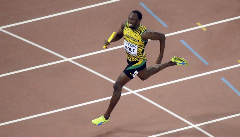 Usain, durante la competencia de 4x100