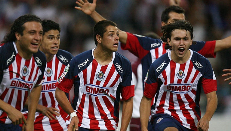 Jugadores de Chivas festejan un gol en Copa Libertadores