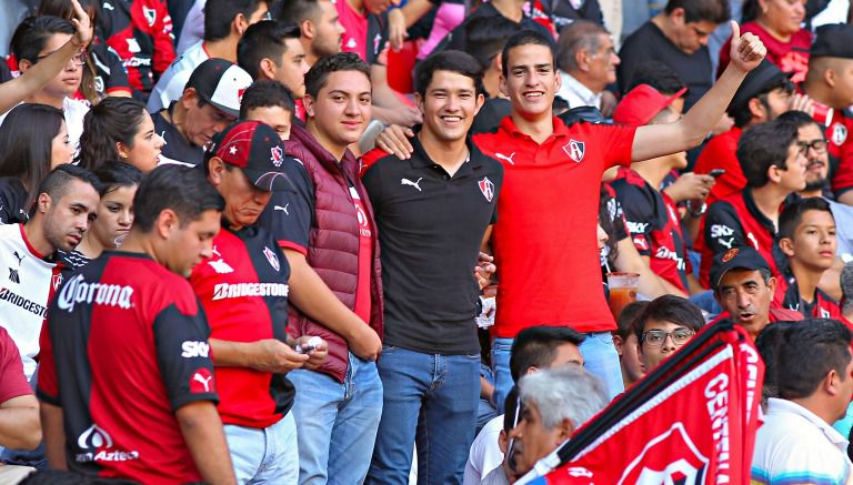 Aficionados rojinegros durante el festejo del Centenario de del Atlas