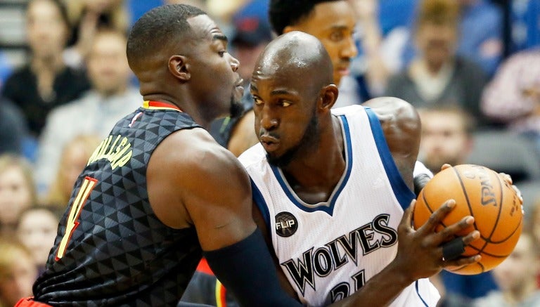 Kevin Garnett y Paul Millsap, en partido de Minnesota