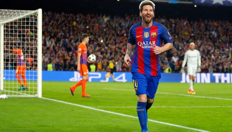 Leo Messi festeja un tanto con el Barcelona en Champions League