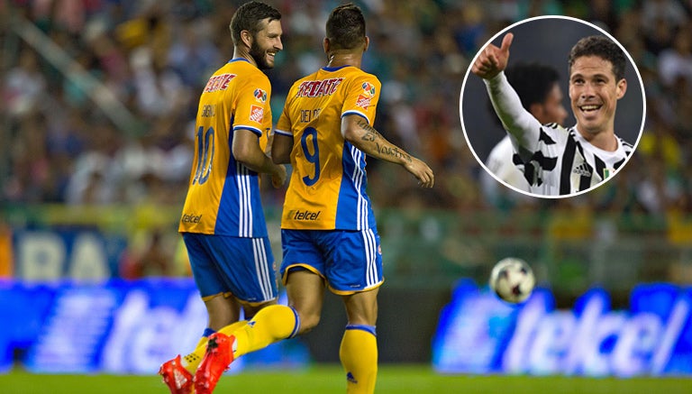 Gignac y Delort platican en un encuentro de Tigres