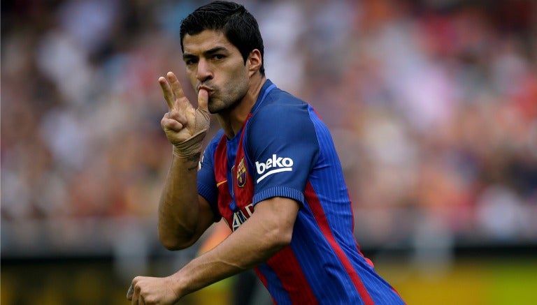 Luis Suárez festeja una anotación con el Barcelona en La Liga