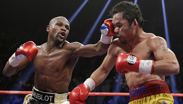 Momento del combate entre Pacquiao y Mayweather Jr.