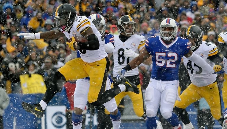 Le'Veon Bell corre para un touchdown contra Buffalo Bills