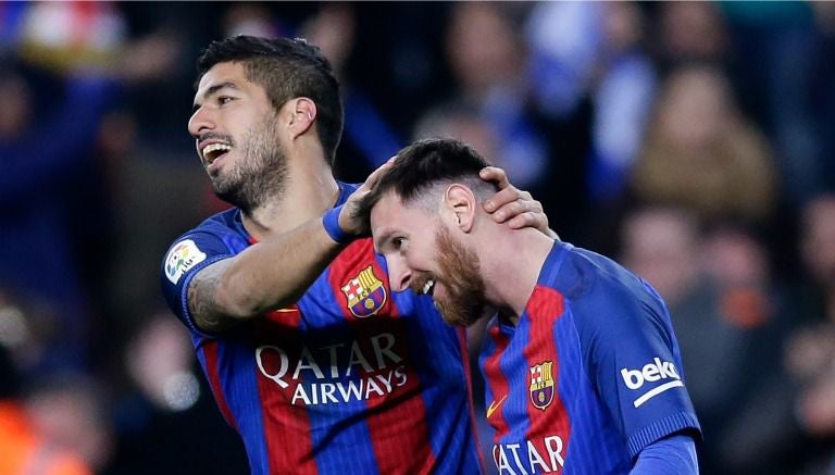 Lionel Messi y Luis Suárez festejan un gol con el Barcelona