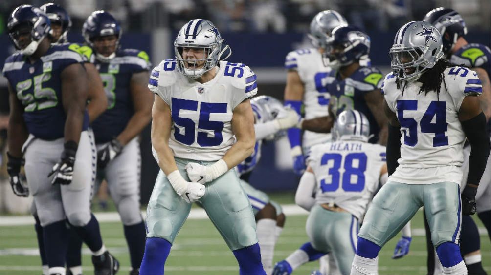 Jugadores de los Cowboys festejan una jugada contra Seattle