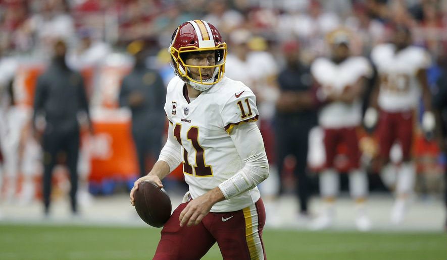 Alex Smith durante un partido con los Redskins