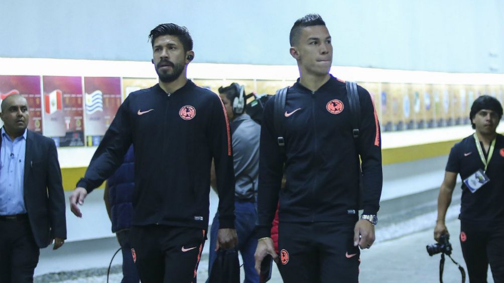 Oribe Peralta y Mateus Uribe previo a un juego de América