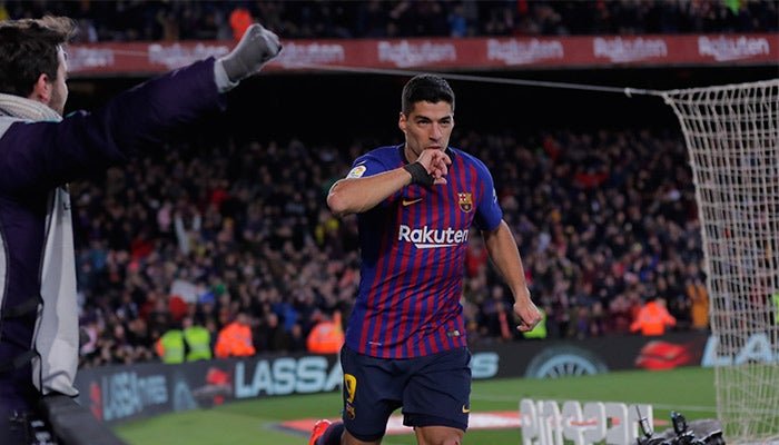 Suárez festejando un gol con el Barcelona 