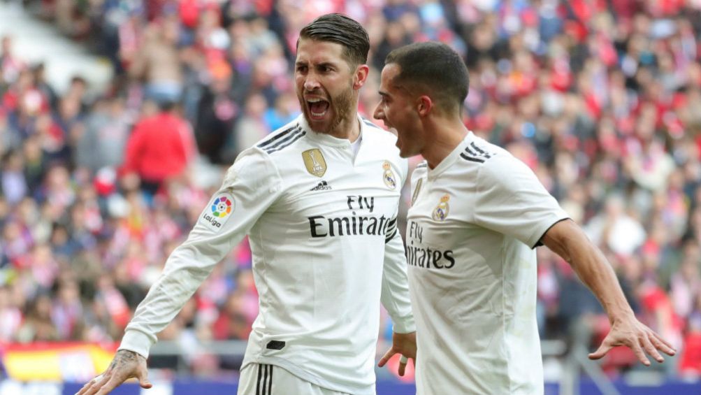 Sergio Ramos y  Lucas Vázquez  festejan un gol vs el Atleti